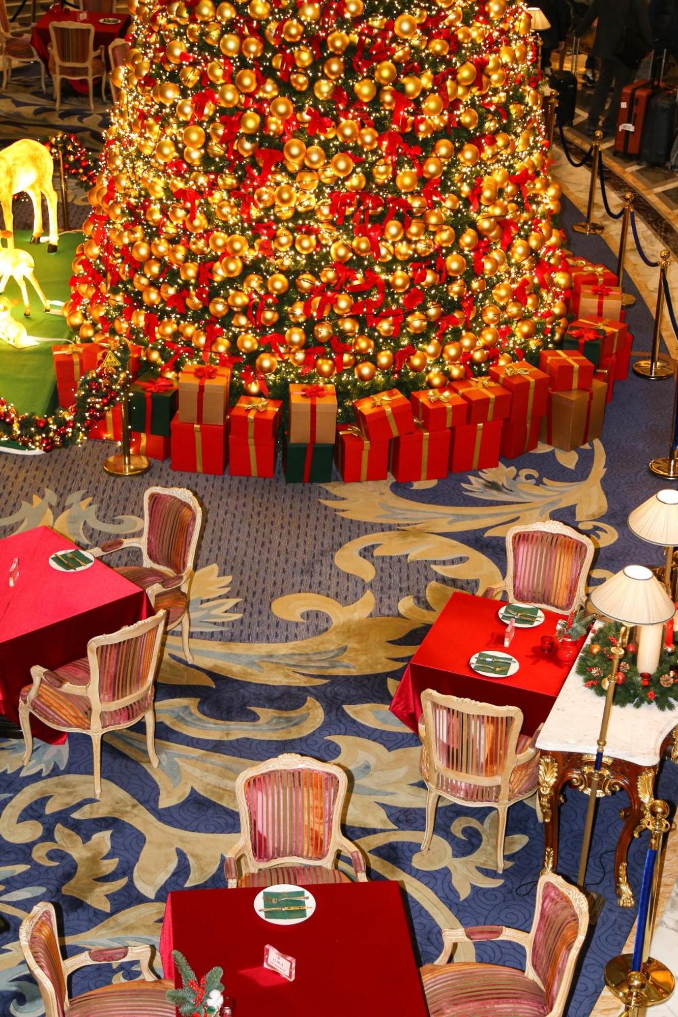 Legendale Hotel Beijing Exterior photo The lobby of the Bellagio Hotel, Las Vegas, Nevada, United States, decorated for the holiday season.