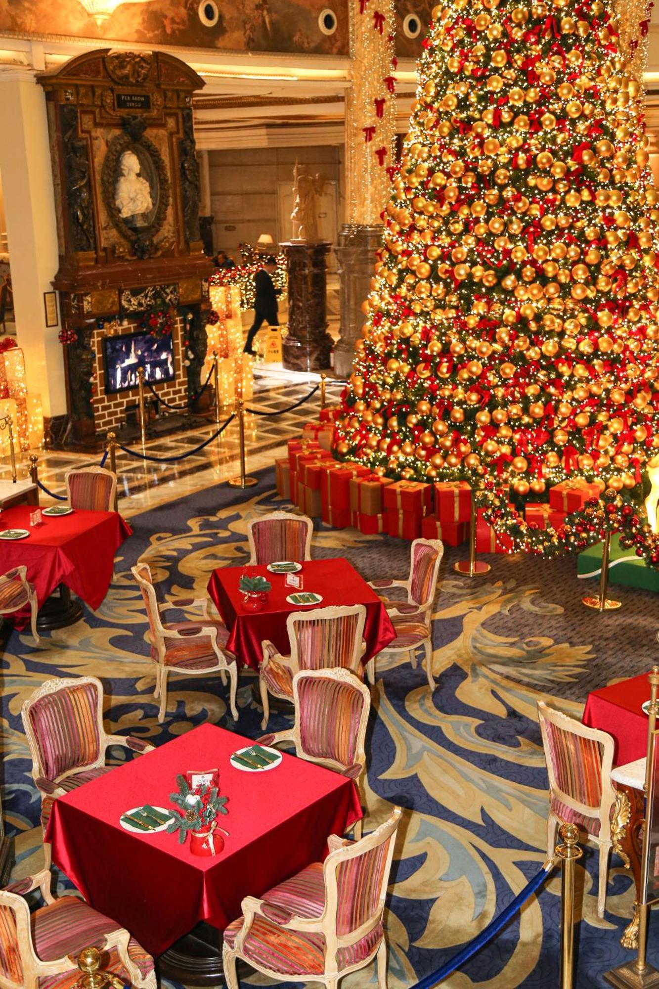 Legendale Hotel Beijing Exterior photo The lobby of the Bellagio Hotel, Las Vegas, Nevada, United States, decorated for the holiday season.